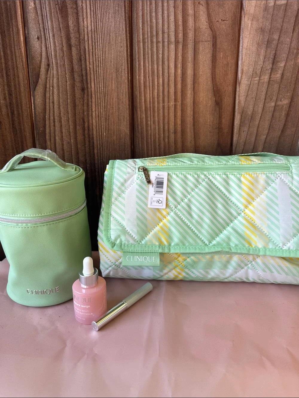 Clinique bundle. Brand new. Unopened. Picnic throw. Makeup bag. Surge and Lip